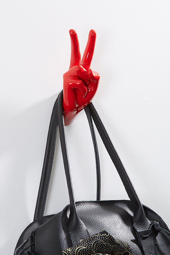 Hand wall art or hook, peace gesture, red colour, and hanging bag