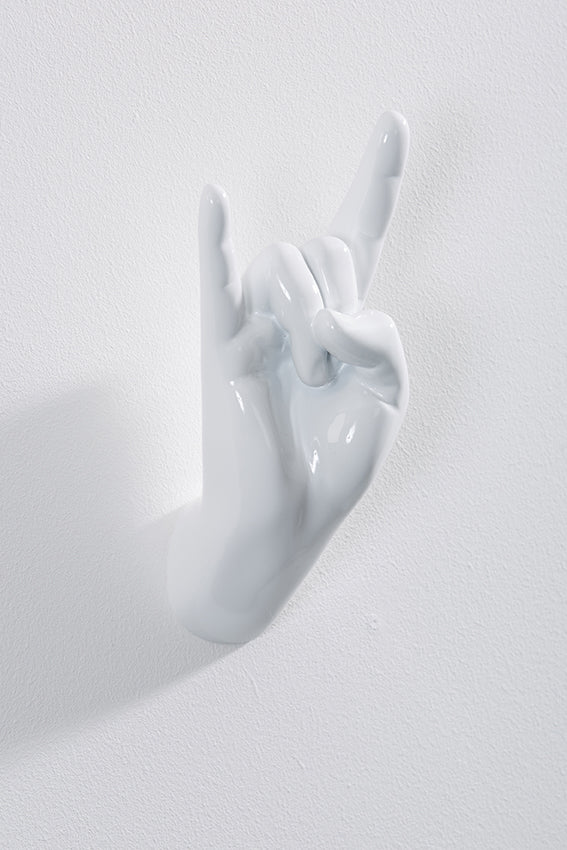 Hand wall art or hook, rock on gesture, and white colour