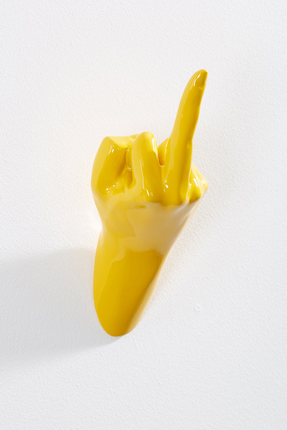 Hand wall art or hook, up yours gesture, and yellow colour