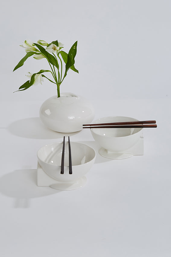 White ceramic bowls, sphere, cube shape, chop sticks