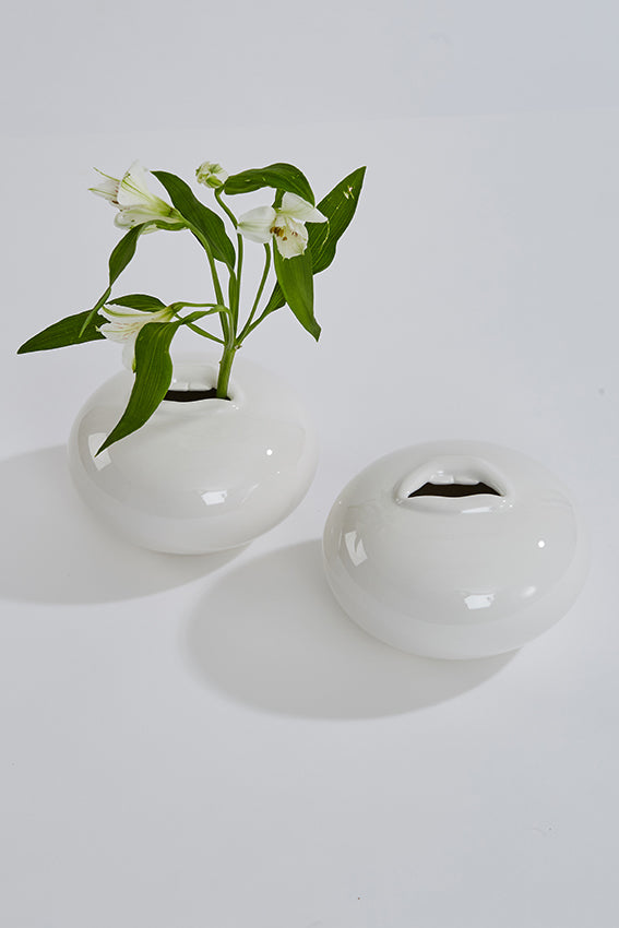 Mouth shaped vase, open mouth, white, and flowers