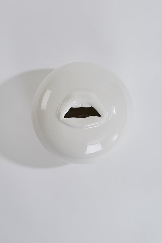 Mouth shaped vase, open mouth, and white
