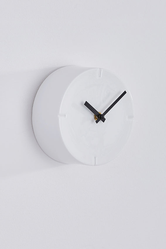 Ceramic wall clock, white, drum shape, and black hands