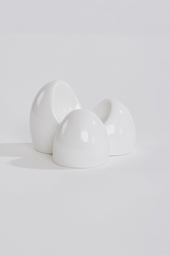 Ceramic egg cup, egg shapes, white colour