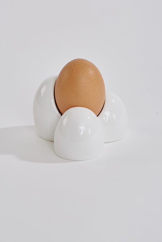 Ceramic egg cup, boiled egg, egg shape, white colour