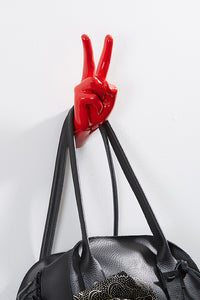 Hand wall art or hook, peace gesture, red colour, and hanging bag