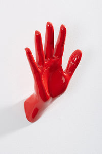 Hand wall art or hook, waving gesture, and red colour
