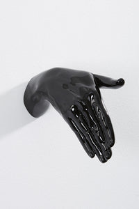 Hand wall art or hook, shaking gesture, and black colour