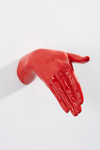 Hand wall art or hook, pointing gesture, and red colour