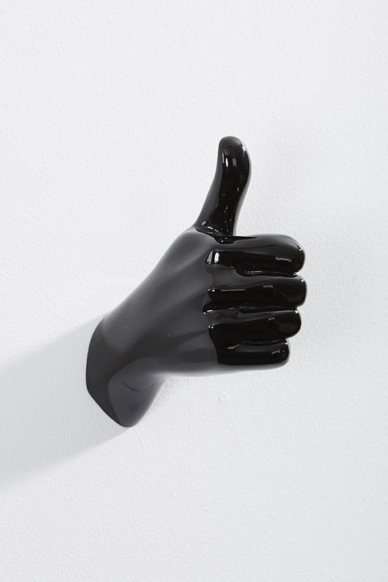 Hand wall art or hook, shape of thumbs up gesture, and black colour