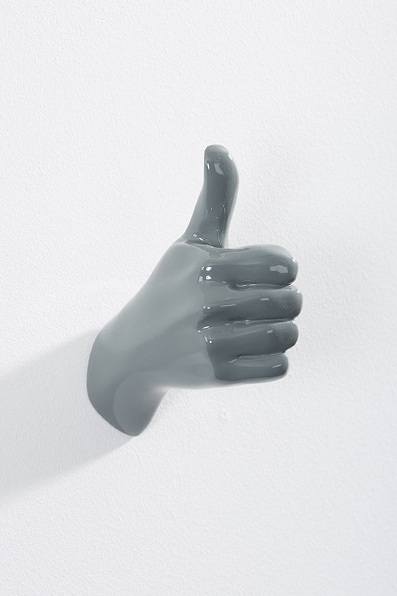 Hand wall art or hook, shape of thumbs up gesture, and grey colour