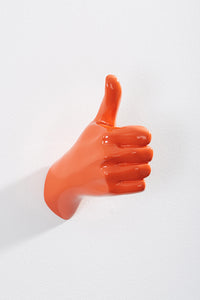 Hand wall art or hook, shape of thumbs up gesture, and orange colour
