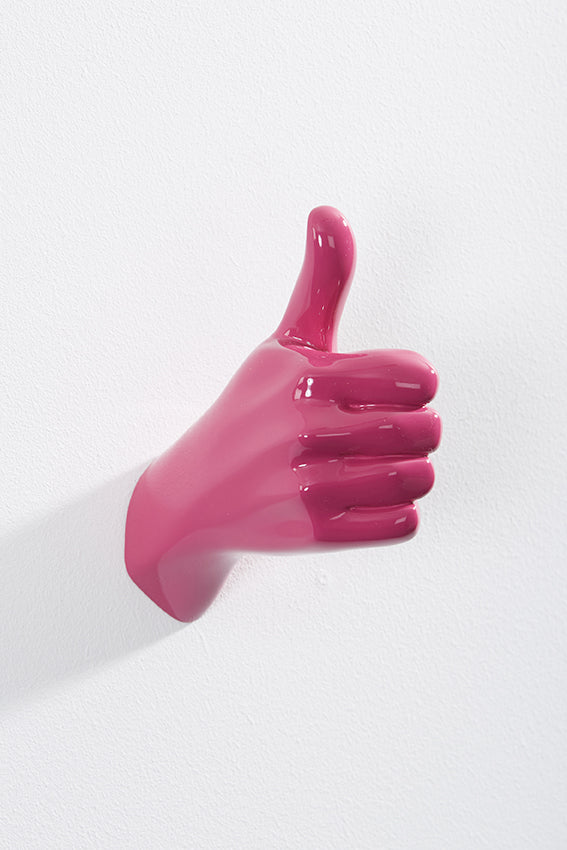 Hand wall art or hook, shape of thumbs up gesture, and pink colour