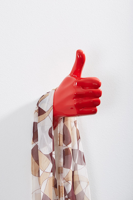 Hand wall art or hook, shape of thumbs up gesture, red colour, and hanging scarf