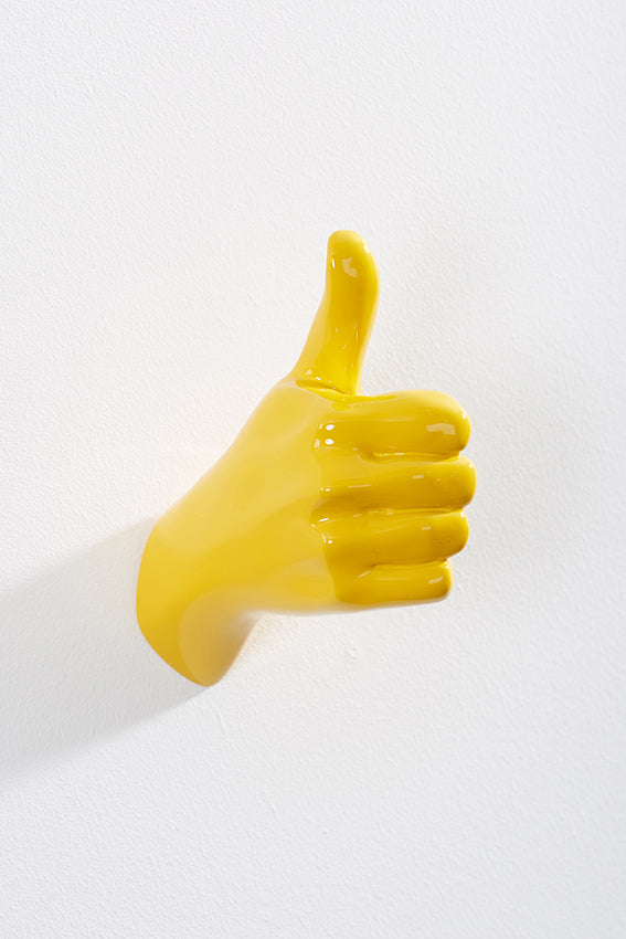 Hand wall art or hook, shape of thumbs up gesture, and yellow colour