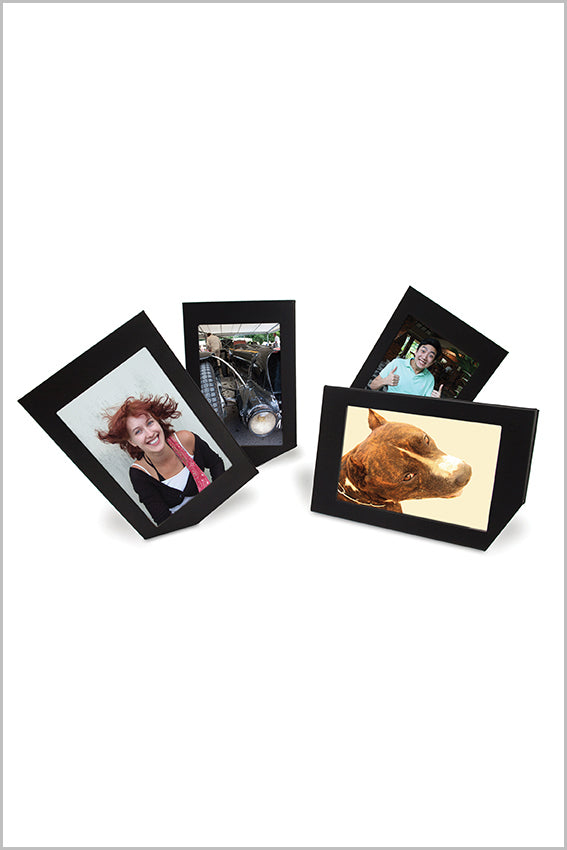 Black photo frames, four, leaning